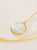 Collar luna concha dorado