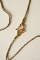 Collar sarta africana y serpiente infinito bronce