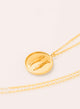 Collar medallon peces dorado
