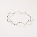 Pulsera marea delgada plata