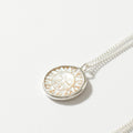 COLLAR SOL CONCHA PLATA