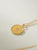 Collar medallon fuego dorado