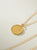 Collar Medallon tierra dorado