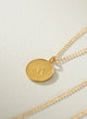 Collar Medallon tierra dorado